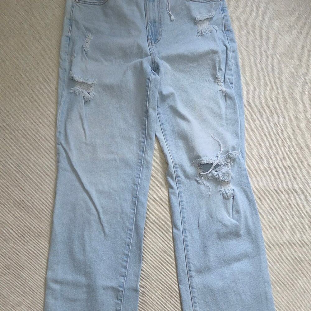 Celebrity Pink Woman's Light Blue Jeans with Manufactured Holes size 11/30